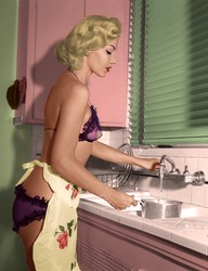 Misty Ayers wearing her costume in the kitchen