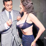 Tempest-Storm-being-measured-by-a-member-of-the-Hollywood-press-1954.-41-24-34-