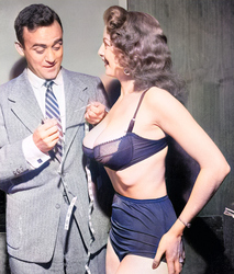Tempest-Storm-being-measured-by-a-member-of-the-Hollywood-press-1954.-41-24-34-