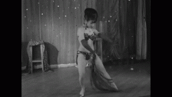 Burlesque Queen (1961) trying to be sexy with her tassels