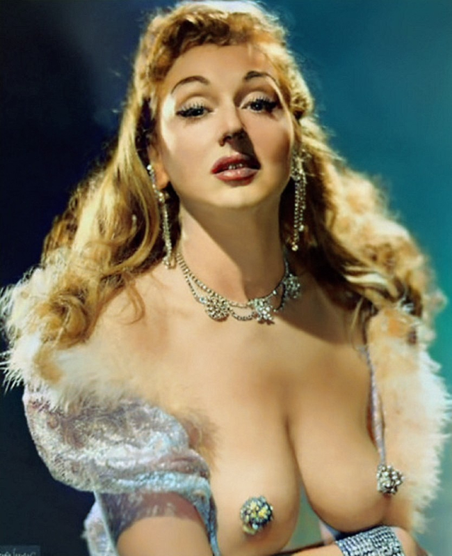 Stripper Lynne O’Neill showing off her sparkly nipple covers