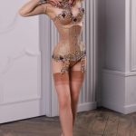 Burlesque performer Katrin Gajndr wearing a sequined corset for a pin-up shoot.