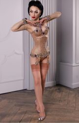 Burlesque performer Katrin Gajndr wearing a sequined corset for a pin-up shoot.